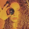 @thecurlycreole