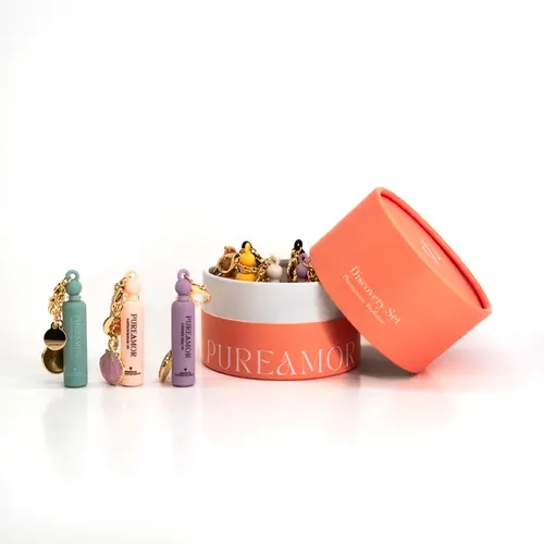 PUREAMOR Women's 13pc Pheromone Perfume Oil Multi-Pack Discovery Set - 12 Scents + 1 Mystery Surprise, Long-Lasting Mini Keychain Fragrance, Designer-Inspired Mini Gift Sets, Perfumes for Women, Unique Gifts