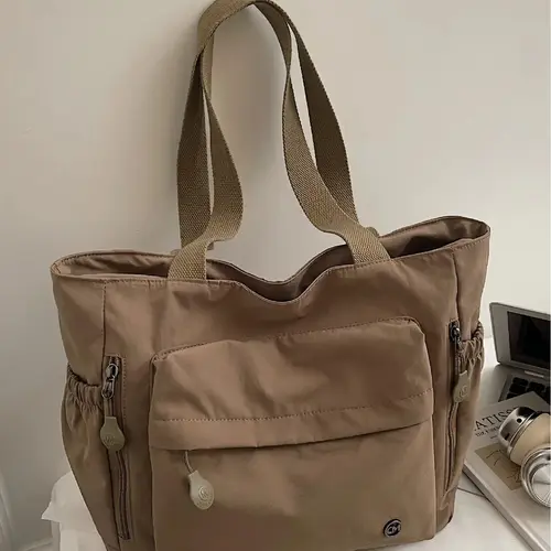 Large capacity women's bag Korean version 2025 new fashion simple one shoulder tote bag canvas bag college student computer bag multi pocket casual multifunctional daily commuter bag Everyday Work Bag suitable for work, shopping, Trendy versatile bag