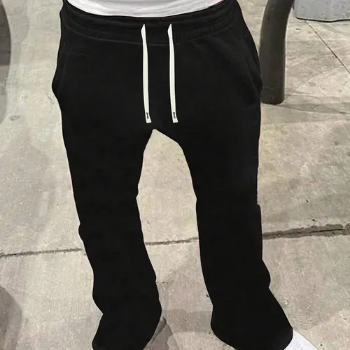 Men’s 100% polyester loose casual pants, soft and slightly stretchy, comfortable and breathable, featuring an adjustable waistband, suitable for year-round outdoor sports and fitness activities. Spring Statement sohochic
