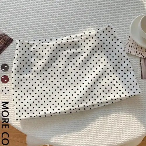 Women's chic polka dot mini skirt with a clean fitted silhouette and side zip closure, a trendy versatile piece perfect for casual going out, date nights, and vacation styling, a classic wardrobe staple for modern fashion.