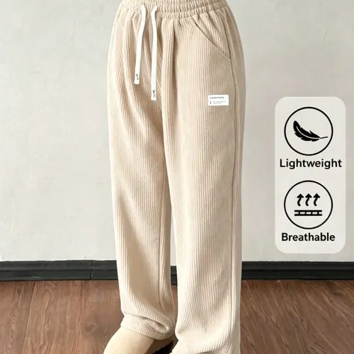 Women’s corduroy pants with a high waist and wide legs, drawstring design, fabric tag decoration, full-length pants. Casual street style; casual pants for everyday outings/casual gatherings; no specific holiday focus; suitable for spring, autumn, and wint