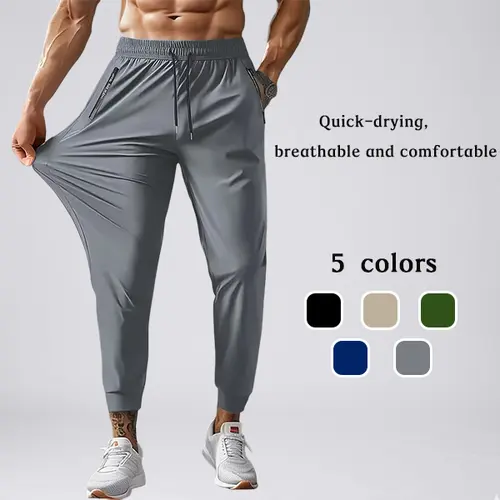 Men’s quick-dry, breathable sports pants with a cool feel; casual long pants with drawstring elastic design and zippered pockets; thin quick-dry rubber latex fabric for men’s motorcycle racing.