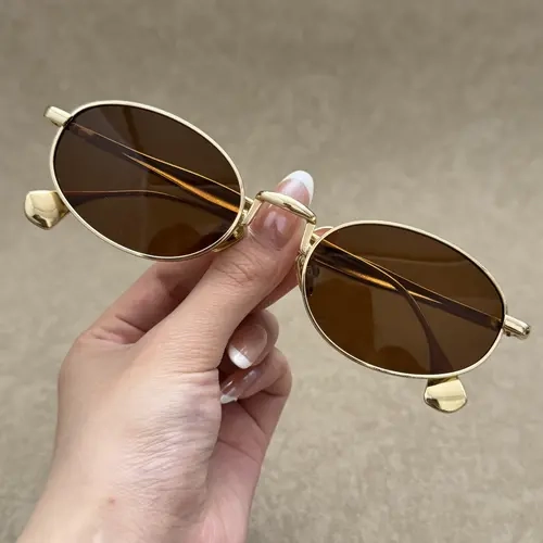 Modern Geometric Gold Frame Sunglasses for Men and Women, Slim Oval Shades That Flatter Any Face Type, Essential for Outdoor Activities, Travel & Daily Outfits