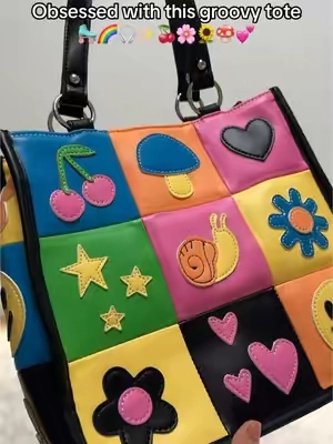 She’s a beauty 💗 #groovy #retro #dollskill #totebag #totebags #giftforher #womensbag #handbag #newyearnewaura #giftguide #tiktokshopholidayhaul #ttsdelight #fashionlookbook 