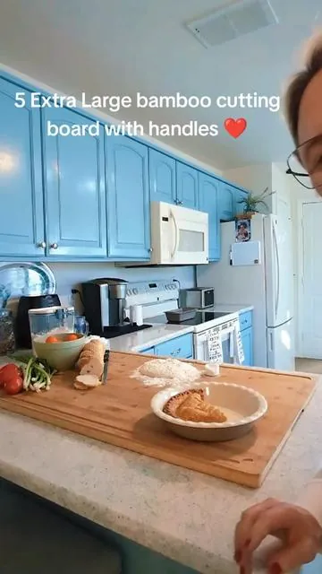 My favorite love to cook with this wooden cutting board also can be used as a serving tray with With handles.  #cuttingboard #giftideas  #tiktokshop #bamboo  #woodencuttingboard  #kitchenessentials  #woodart #charcuterie #charcuterieboard  #@Kikcoin Kitchen 