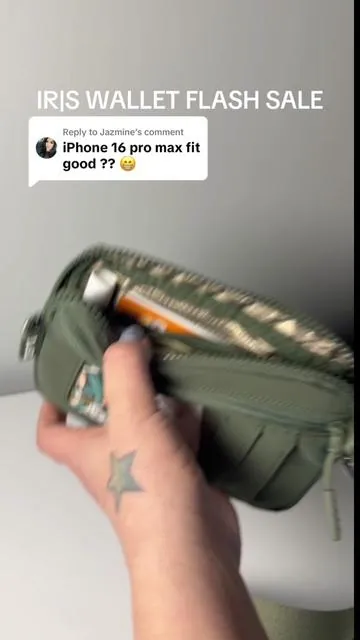 Replying to @Jazmine Iris carry all wallet holds your phone!  #iris #iriswallet #pursetok #phonebag #phoneholder #musthave #cardwallet #momtok #pursetok #travellife #TikTokMadeMeBuylt #wallet #musthave #viral #ttshop #theiriswallet #chapstick #phonecase #phonewallet #olivegreen #wallettok
