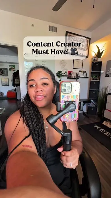 My absolute new favorite gadget! It’s also folds up super compact it can fit in my purse! Make sure to stay until the end for my favorite feature! 🤩 #AE #contentcreation #phonegimbal #gimbal #contentcreator 