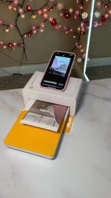 Print all your favorite pictures at home with this Kodak printer! #kodakprinter #printer #portableprinter #kodak #scrapbooking #giftideas #instantphotoprinter