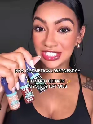 @NYX Professional Makeup x WEDNESDAY Collection 😍❤️‍🔥❤️‍🔥❤️‍🔥 EXCLUSIVE only here on TikTok for the next 2 days before they hit stores! These mystery fat color shifting lip oils are BEAUTIFUL 🤌🏽 GRAB THEM NOW! 🤗 #nyxcosmetics #nyxwednesday #nyxcosmeticspartner #tiktokshopbeauty #ttsbeautybesties #trendingmakeup 