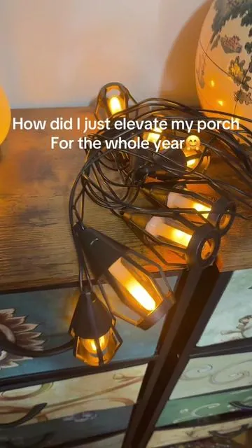 I cannot even believe that these flickering torch hanging lights are solar powered so I don’t have to mess with the electricity! ##hanginglights##stringlights##flickeringlights##outdoorlighting##porchdecor##backyardvibes
