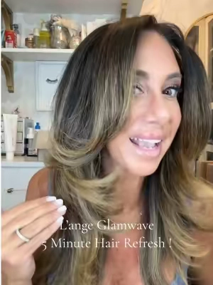 Stop rewashing your hair just to get that fresh blowout look again!! As a hairstylist, I promise—your day-old hair doesn’t need another shampoo, it needs the right tool. The @langehair GlamWave Hot Brush is designed to revive, refresh, and smooth your style in minutes. With 5 heat settings and an upgraded barrel that never snags, it brings your hair back to life without unnecessary heat damage. This is my go-to for quick blowout touch-ups at home. #blowoututorial  #langehair  #hairrefresh #hotbrush  #salonhairathome  #hairtutorial  