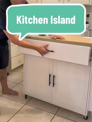 From cooking to entertaining, this farmhouse-style kitchen island offers extra storage, a foldable counter extension, and locking wheels to stay in place. #tiktokshopcreatorpicks #TikTokScenesContest #farmhousestyle #kitchendesign #homeessentials 