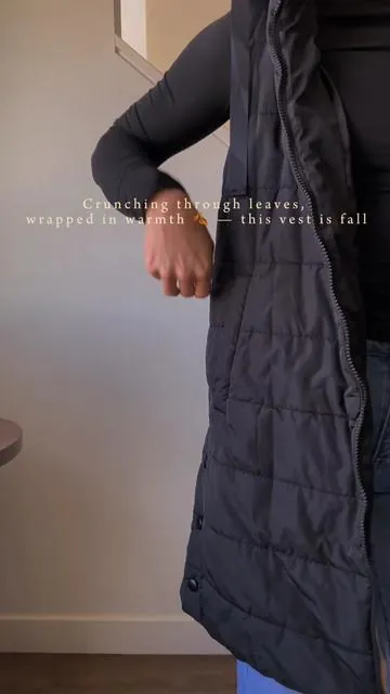 Layering up in a long fall vest, the ultimate piece for cozy, chic autumn outfits. Perfect for crisp mornings, crunchy leaves underfoot, and effortless transitional style. Pair it with a knit sweater, ankle boots, and warm tones for the perfect fall fashion look #outfitinspo #falloutfits #falloutfitinspo #falloutfitideas #vestoutfit 