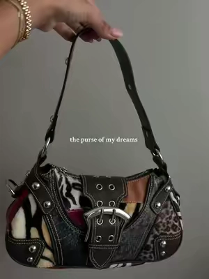 she’s so stunning omg  #y2kfashion #purse #handbag #shoulderbag #dollskill @Dolls Kill 