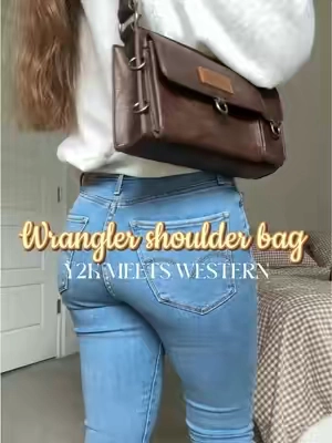 Wrangler shoulder bag! Y2K meets western vibes! So many compartments for all the essentials. Love the turquoise charms on the bag. Such a cute and trendy purse! Comes in other colors. FREE SHIPPING. Sample provided by @Rustic Charm Bootic #wranglerpurse #shoulderbag #handbag #westernstyle #y2kstyle 