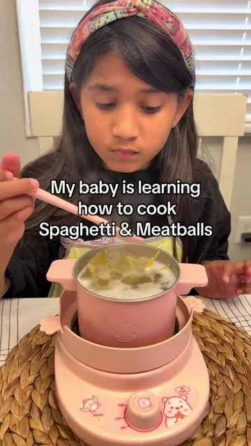 Learning how to cook spaghetti and meatballs using our Montessori cookware set. #montessori #montessoritoys #fyp #foryoupage 