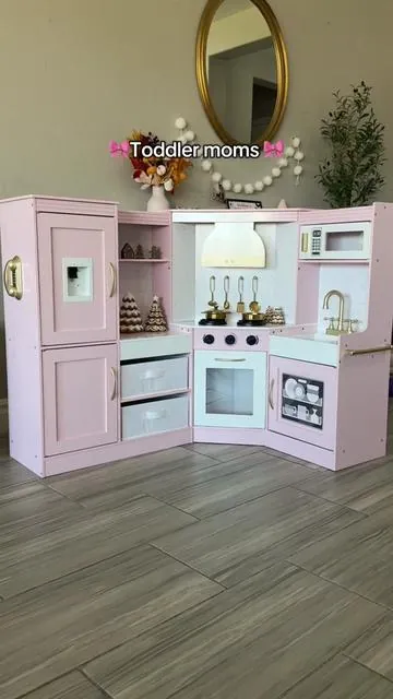 Bestie, this pink kitchen is beyond adorable 😍 It’s one of the top trending toys for kids for a reason — it keeps them busy, creative, and learning all at once 🙌 It’s the perfect kids activity that doubles as one of those early development & activity toys, helping with imagination and life skills while they play. Honestly, one of the cutest children early education toys I’ve seen — and it totally makes the playroom feel -perfect 💕 #tiktokshopcreatorpicks #toddlermom #toddlergifts #playkitchen 