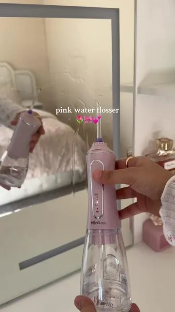 the power on this thing??! #waterflosser #flossing #pinkwaterflosser #pink #teethcare 
