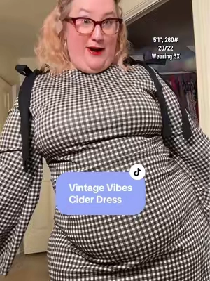 This Cider gingham mini dress is giving vintage charm with a modern twist — boat neck, bow straps, and flared sleeves! 🎀 #minidress #plussizedress #ginghamdress #fallfashion #plussizetryon 
