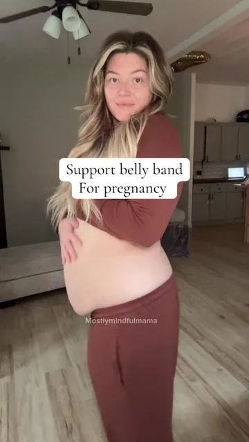 I love the way this belly band gives me support but also rounds out my baby bump 🥰 it helps my round ligament pain a ton! #bellyband #pregnancymusthaves #pregnancy #momcozy 