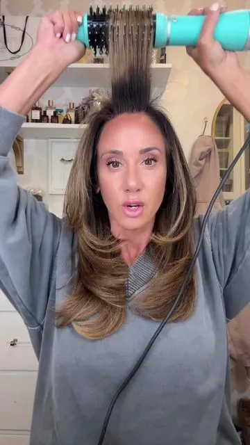 ITS BACK!!!  The new Volume Boost by @langehair is UNBELIEVABLE!!! It's lighter it's more powerful, and  somehow even cheaper than the original . The barrel is infused with coconut oil leaving the most insane shine on your hair!!! Limited quantities so runnnn!!  Use code LANGVIP104 to save 10% !   #blowoututorial #blowoutbrush #shoplange #frizzfreehair #blowouthair   