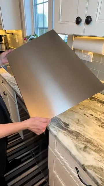 This stainless steel kitchen board is now the primary work surface in my kitchen. The material makes it hygienic for food and meal prep. I use it every single day. #stainlesssteel #stainlesssteelcuttingboard #kitchengadgets #cookinghacks #foodprep 