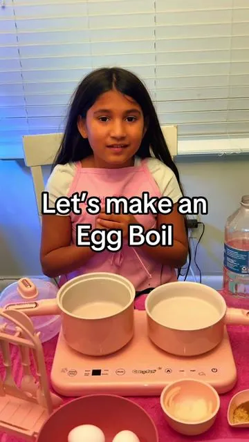 Learning to make an egg boil using my double stove Montessori cooking set. #fyp #foryoupage #montessoritoys #kidscooking #montessoriathome 