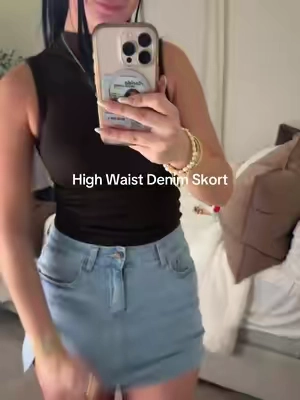 High-waist denim skort for women 👖 Flattering fit with the comfort of shorts and the look of a skirt. Easy everyday outfit for spring and summer. Tap to shop ✨ #HighWaistDenimSkort #DenimSkort #SkortOutfit #SummerOutfit #WomensFashion 