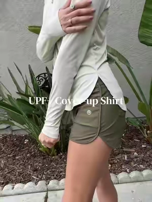 Throw it on and go ☀️ Quick-drying UPF sun protection that works over a swimsuit or for all-day adventures in the sun. Wearing a small in the color oatmeal. #ggradual #sunprotectionshirt #upfshirt #swimsuitcoverup #beachcoverup 