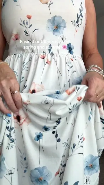 This midi dress is so easy and pretty. Pairing it with a denim jacket is so cute. #summerdress #springdress #easterdress #momdress 
