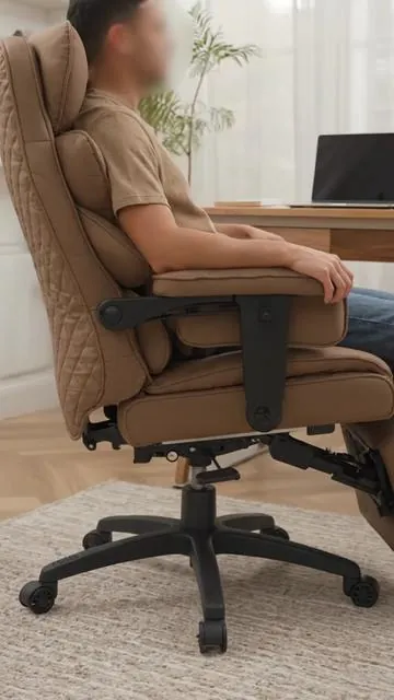 Elevate your workday or gaming marathons with the Dowinx Big and Tall Office Chair! Designed for support, it features a comfortable pocket spring cushion, high back, and adaptive linkage armrests. The convenient footrest adds an extra layer of relaxation. Perfect for executive desks or intense computer gaming. Find your comfort zone! Shop now. #officechair #gamingchair #ergonomicseat #worksetup #AIGC #Moras