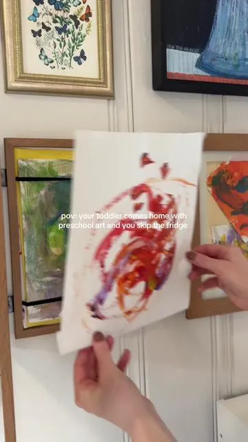 Love swapping out and storing all my toddlers art in these frames 🥺 keeping them up in the playroom makes it feel so special  #kidsart #playroomideas #momfinds #toddlerartactivities  #homeorganization