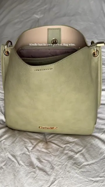 A pocket that fits an e-reader, a crossbody strap for hands free, and a sage green that goes with everything. #montanawestbags #montanawest #bucketbag #sagegreenbag #organizedpurse 