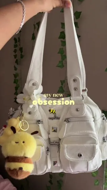 i loveee @beenuvo @Angelkiss Bags 💛 #bagcharms #beenuvo #angelkiss #cutepurse #pursetok 