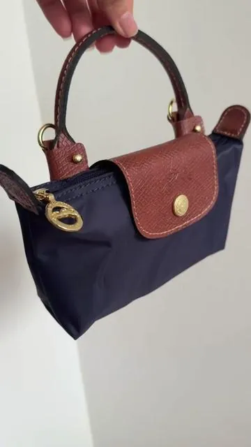 Found the cutest little purse on TikTok shop  🤎🤭💙 #crossbodybag #bagfinds #tiktokshop #fypシ  
