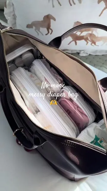 Everything I need for both my babies, easy to find 🤭🤍 #organizedmom #momhacks #diaperbagessentials #fyp #diaperbagmusthaves 