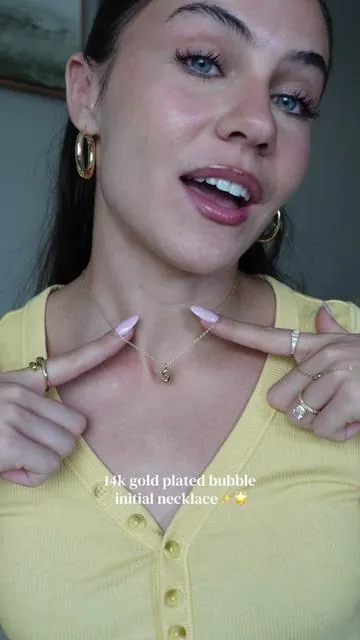 Dainty gold plated bubble initial necklace from Pavoi!! Super affordable and amazing quality! I’ve had this for months and it hasn’t tarnished!  #pavoi #tarnishfreejewelry #letternecklace #initialnecklace #daintyjewelry 