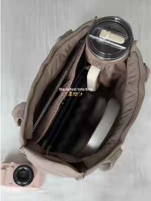 A perfect tote with cup holder inside! #totebag #tiktokshopcreatorpicks #newfunpicks #cutebag #whatsinmybag 
