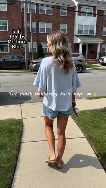 The ultimate forgiving top has entered the chat. ☁️✨ Whether you're hiding a food baby or a real baby, this loose fit is EVERYTHING.#summer2026 #womenfashion #shorts