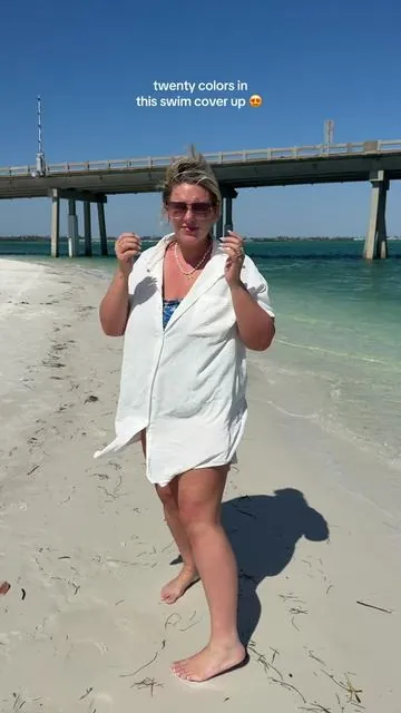 This lightweight button-down swimsuit coverup is the easiest way to go from beach to lunch without changing your whole outfit. Flowy, breathable, and effortlessly cute—this is the vacation staple you’ll wear on repeat. #beachcoverup #vacationoutfit #resortwear #swimsuitcoverup #beachstyle 