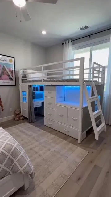 Transform your child's room into a super functional and fun space! 🤩 This twin low loft bed packs it all: 7 storage drawers, a built-in bookcase, and cool LED lights. ✨ It also includes a 14" H safety guardrail, inclined ladder, and a play curtain for a fantastic under-bed play zone. Give them a great spot to sleep, play, and keep things tidy. Tap to shop this smart solution! #kidsroom #loftbed #storagesolutions #playroom #AIGC #Moras