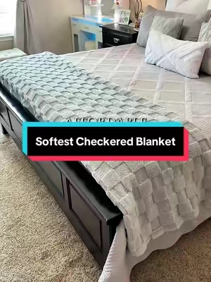 We snuggle under this on the couch and it’s just SO SOFT!  #blanket #softblanket #bedding #kingsizeblanket #checkeredblanket 