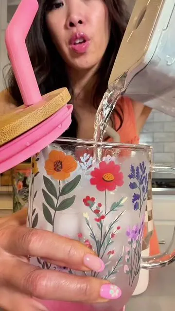 SO pretty 🌸✨ this aglass tumbler is giving aesthetic iced coffee girl vibes without the plastic 🙌 stainless steel straw + silicone grip = cute and practical 💕 perfect for matcha, iced coffee, or water on the go—and the price?! run don’t walk 🏃‍♀️  #aesthetictumbler #glasstumbler #affordablefinds #drinkware #cutecups