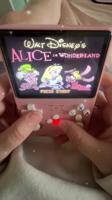 one of my many favorite Disney games on this console 🌸♥️🫖🐱👗 #aliceinwonderland #cheshirecat #gameboyadvance #retrogames #girlygamer 