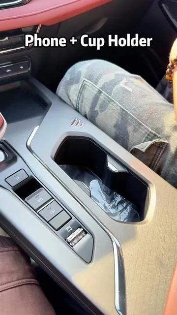 This is a 2-in-1 cup holder and phone mount — it holds your drink and your phone at the same time.#cupholder #caraccessories #phoneholder #carhack #carsetup