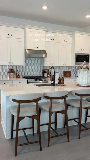 Update on the viral barstools✨ Honestly they are holding up sooo good 😭 I have 3 kids so i needed something easy to clean & durable and these have been exactly that. Super sturdy, easy to wipe down, and we’ve already had family over a few times and they still look great. Definitely worth it🤌🏼