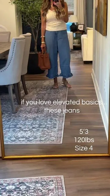 Found the cutest look for less jeans and the ruffle hem detail makes them look so elevated. Perfect if you want that boutique denim vibe without the boutique price tag. Wide leg jeans are still having a moment and these are such a fun statement piece for summer outfits. #LookForLess #WideLegJeans #TikTokShopFashion #Over40Style #AffordableFashion     
