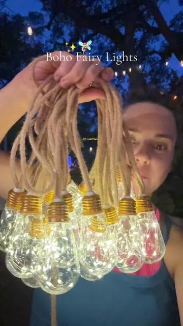 Outdoor solar fairy string lights on a real rope with Edison style bulbs! The prettiest outdoor waterproof lights! #SolarLights #StringLights #FairyLights #OutdoorLights 