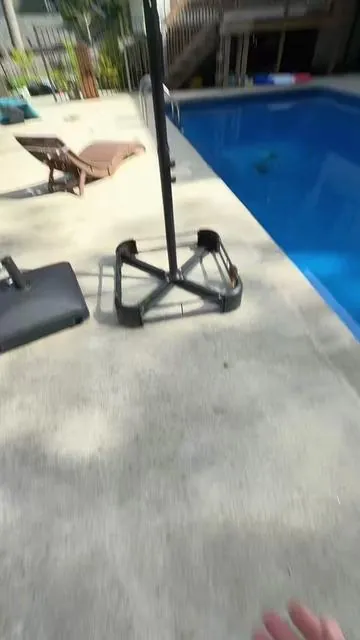 Rolling weighted umbrella base#umbrella #pool #patio #deck #bbq 
